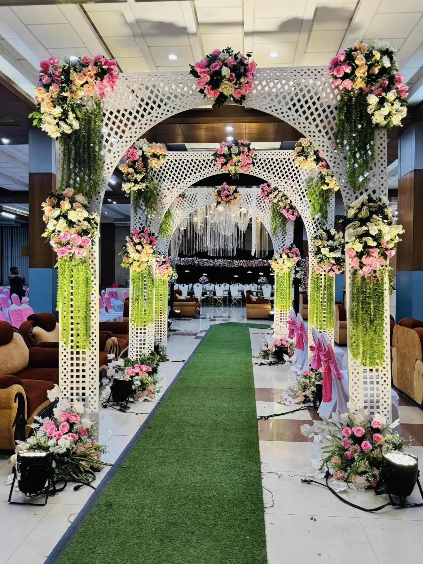 White lattice floral entrance walkway