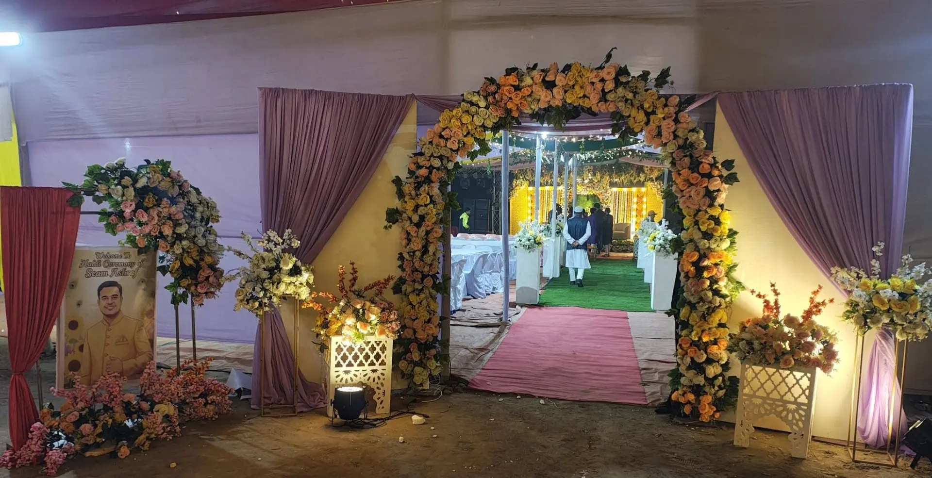 Rose arch entryway to the haldi ceremony
