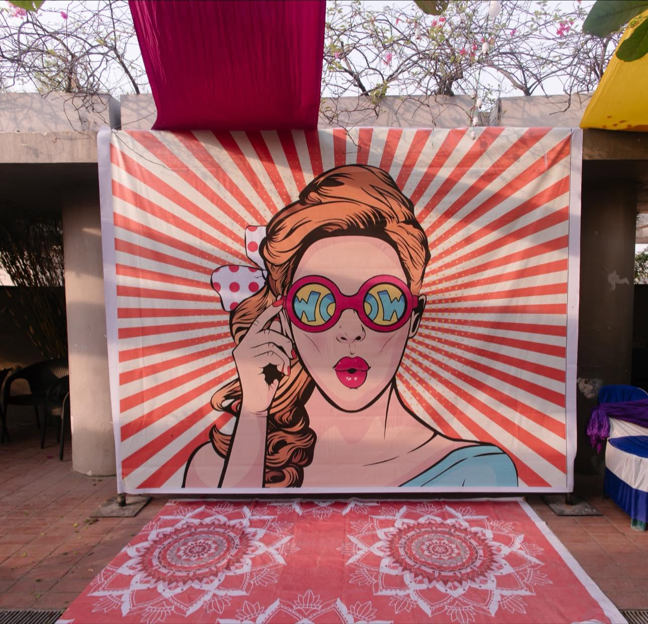 Pop-art printed backdrop for the holud photo corner