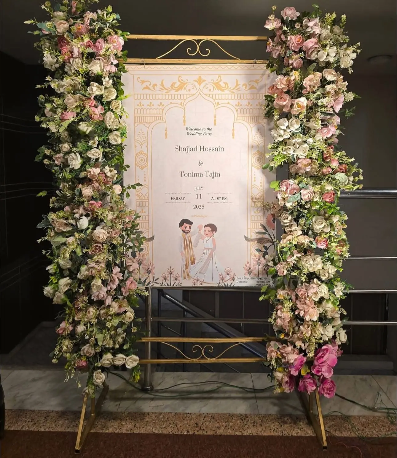 Floral framed wedding welcome signage