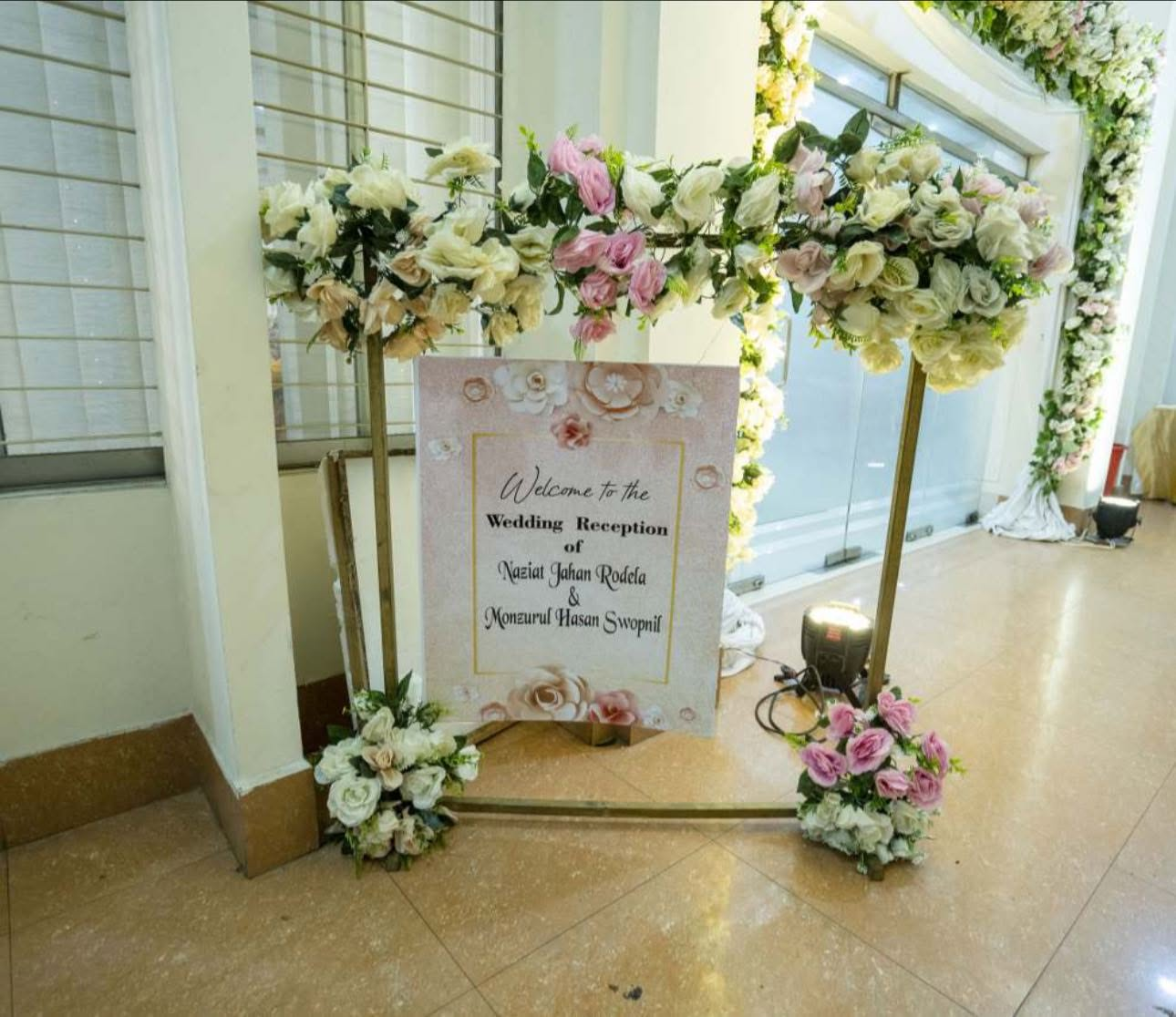 Floral framed welcome board for the wedding reception